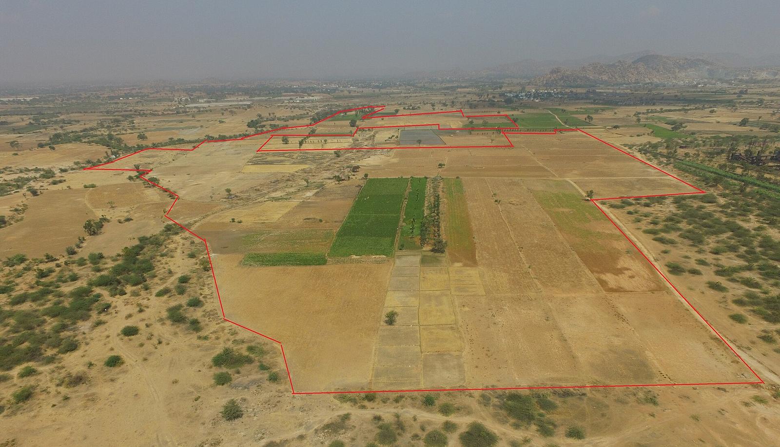 A marked land parcel in Karnataka before solar construction